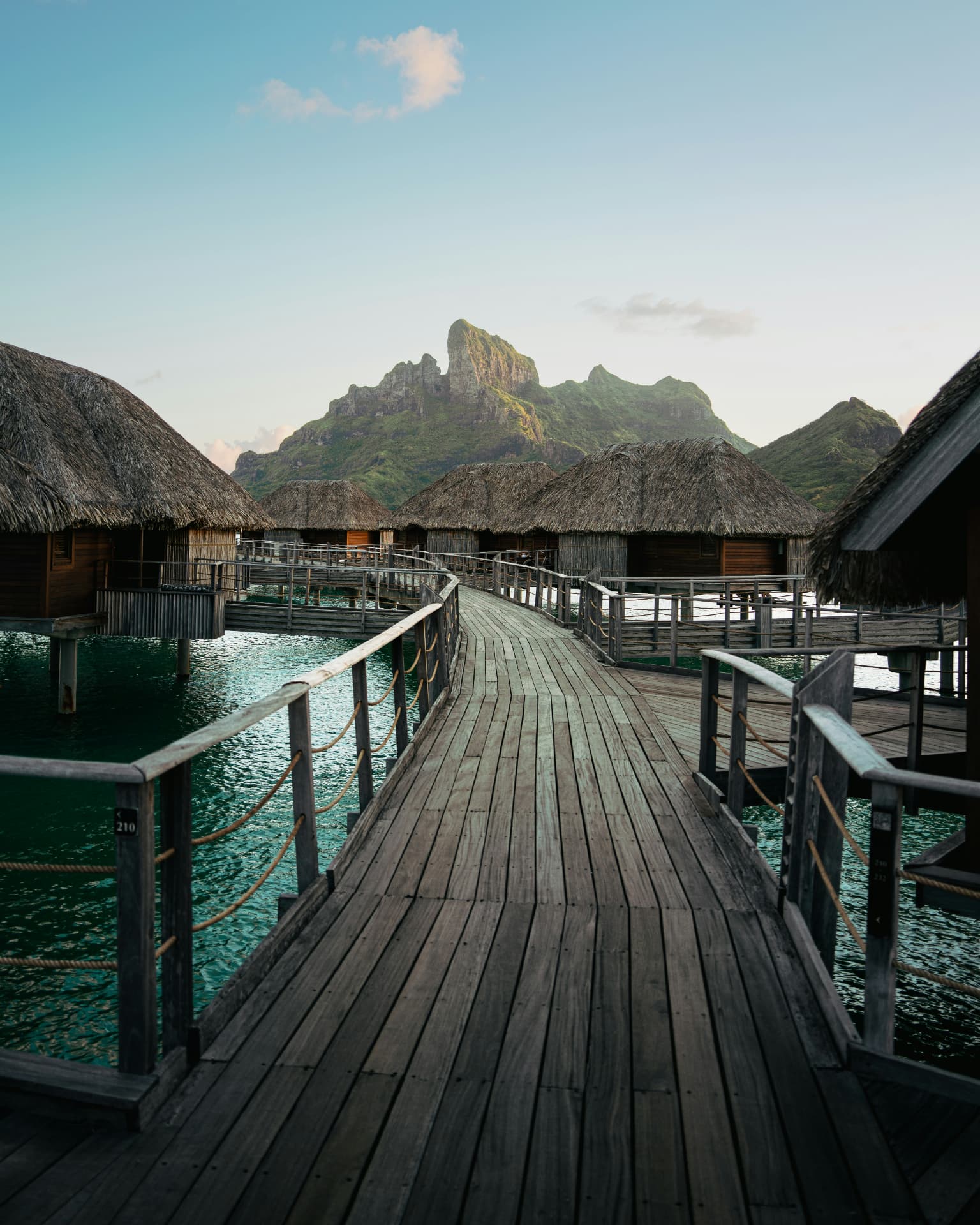 Overwater bungalow walkway facing Mount Otemanu, Bora Bora